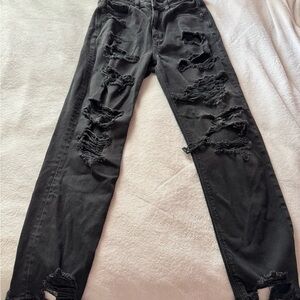Woman’s Distressed Black Jeans